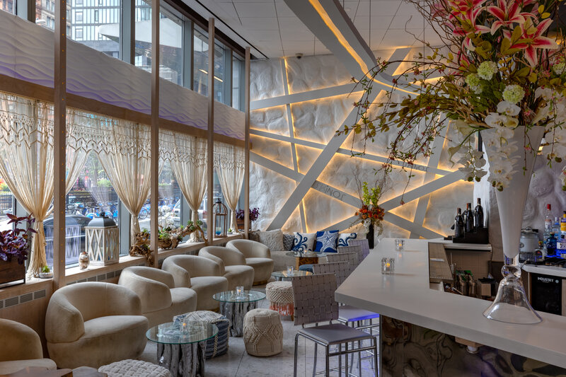 Bar and lounge area during the day with low-top seating